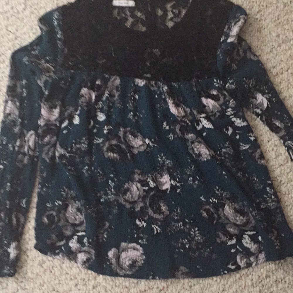 Green and black shirt with lace at the top